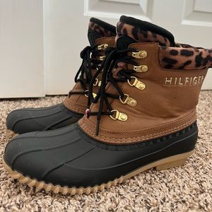 Tommy Hilfiger muddy snow boots.
